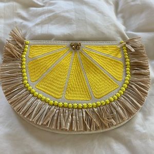 Lemon and raffia clutch from Stella and Dot